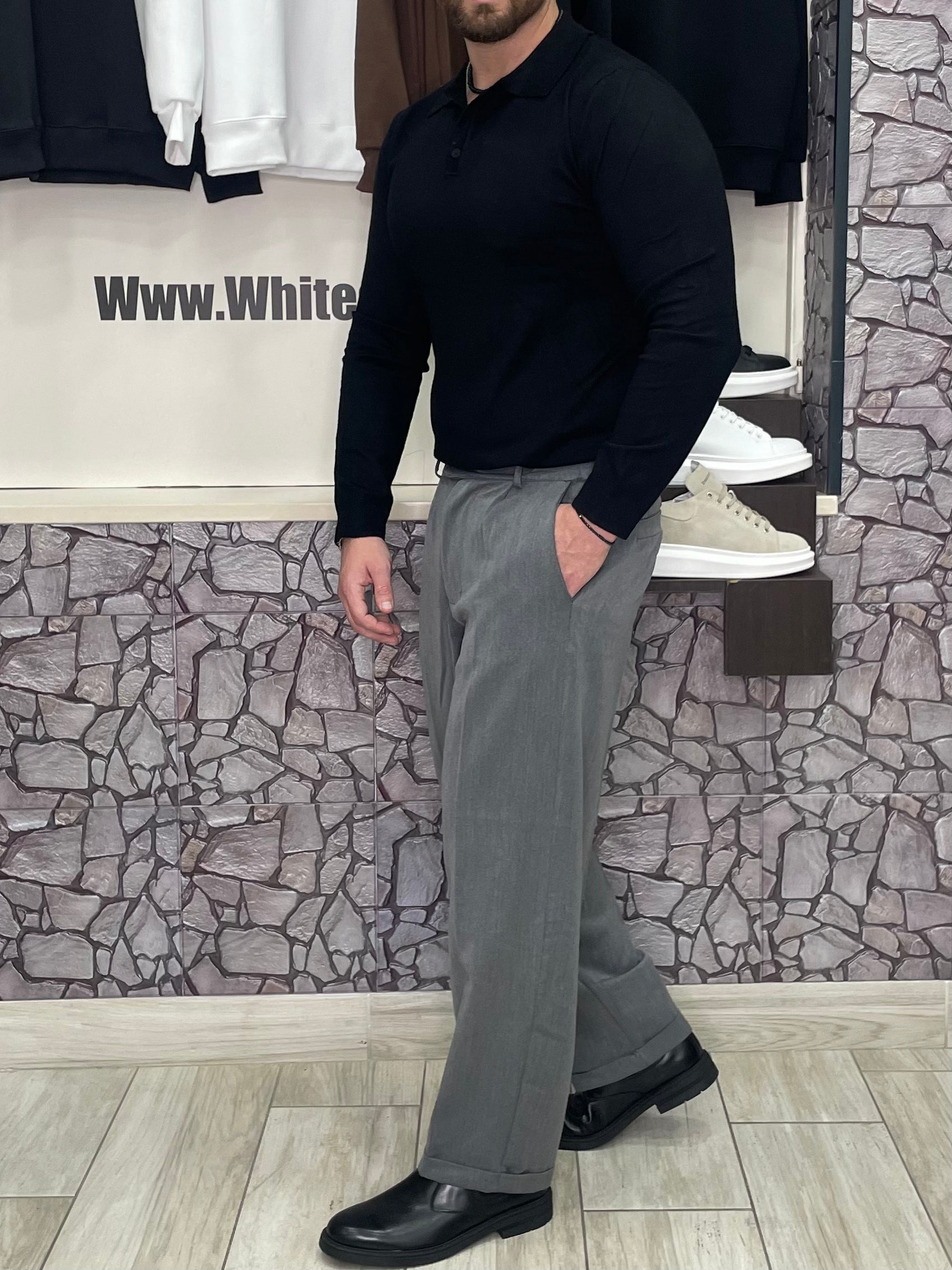 Polo con bottoni in lana pettinata