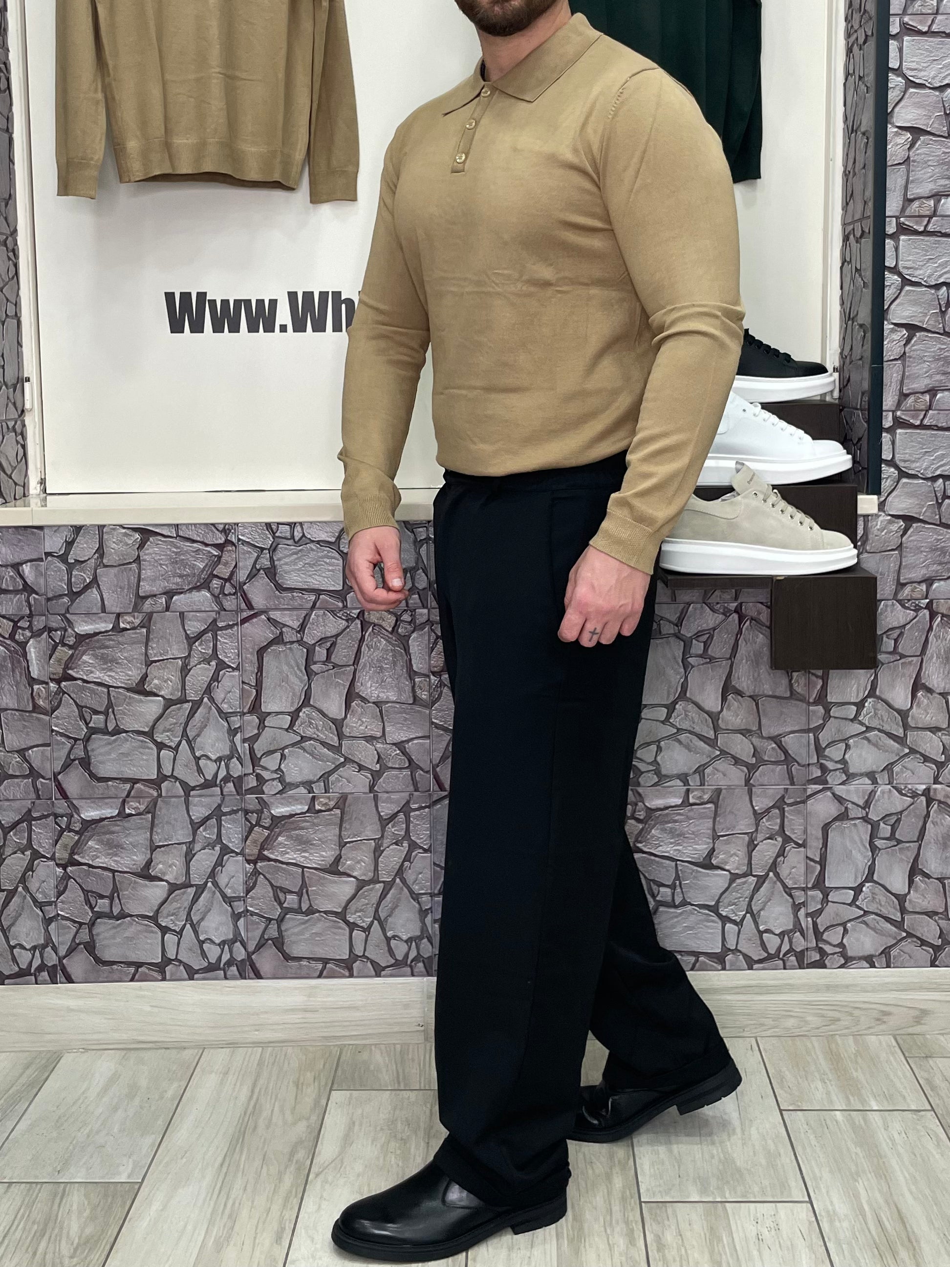 Polo con bottoni in lana pettinata