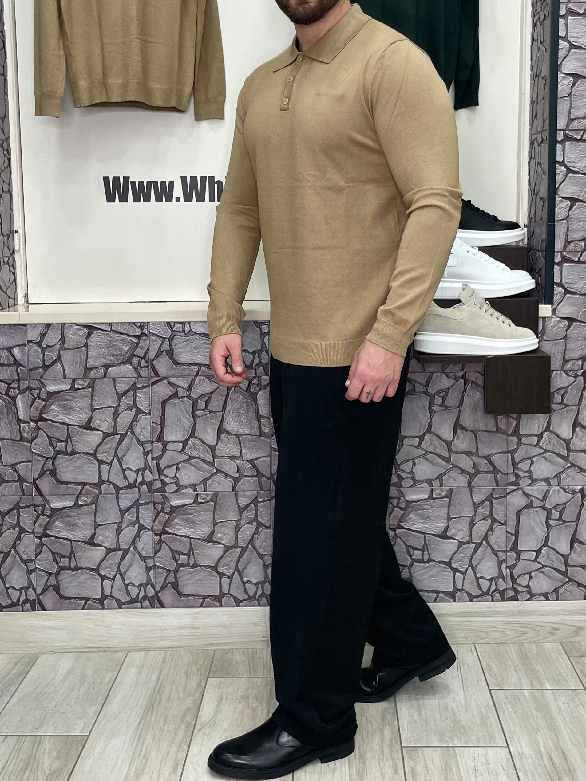 Polo con bottoni in lana pettinata