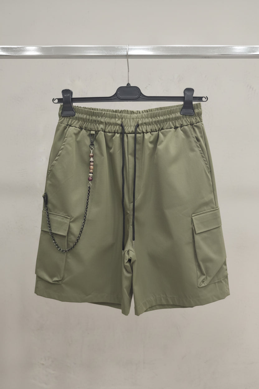 BERMUDA IN COTONE CON TASCONI COLORE VERDE